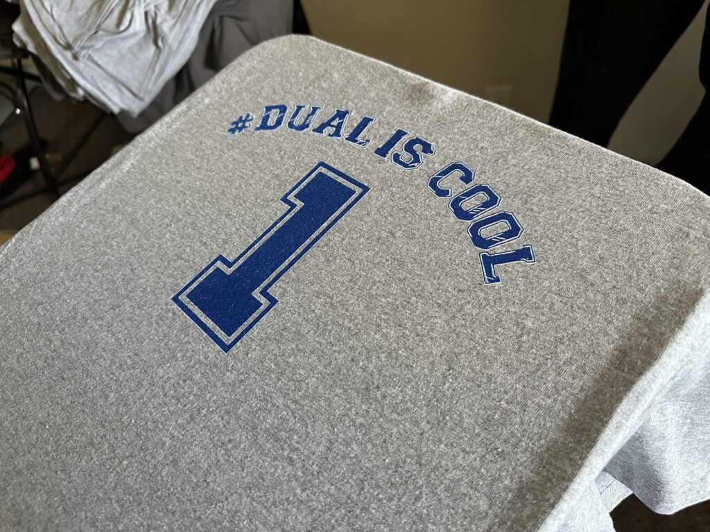 Screen printed back of t-shirt for a local school