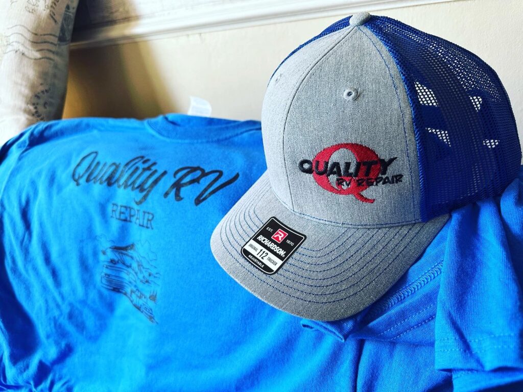 Hats and t-shirts at The Print Plug embroidery and screen printing shop in Nampa