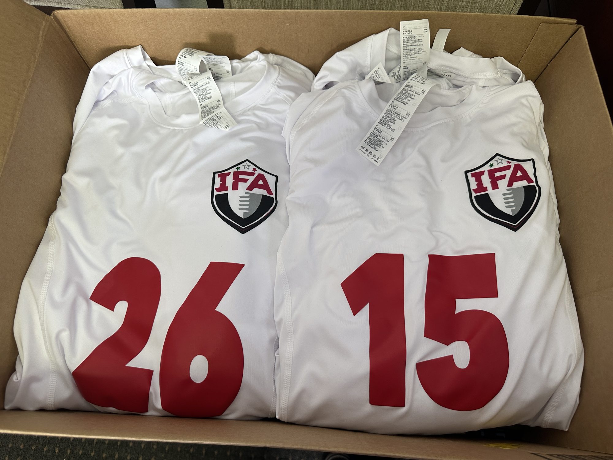 Custom screen printing and heat-transfer vinyl on jerseys