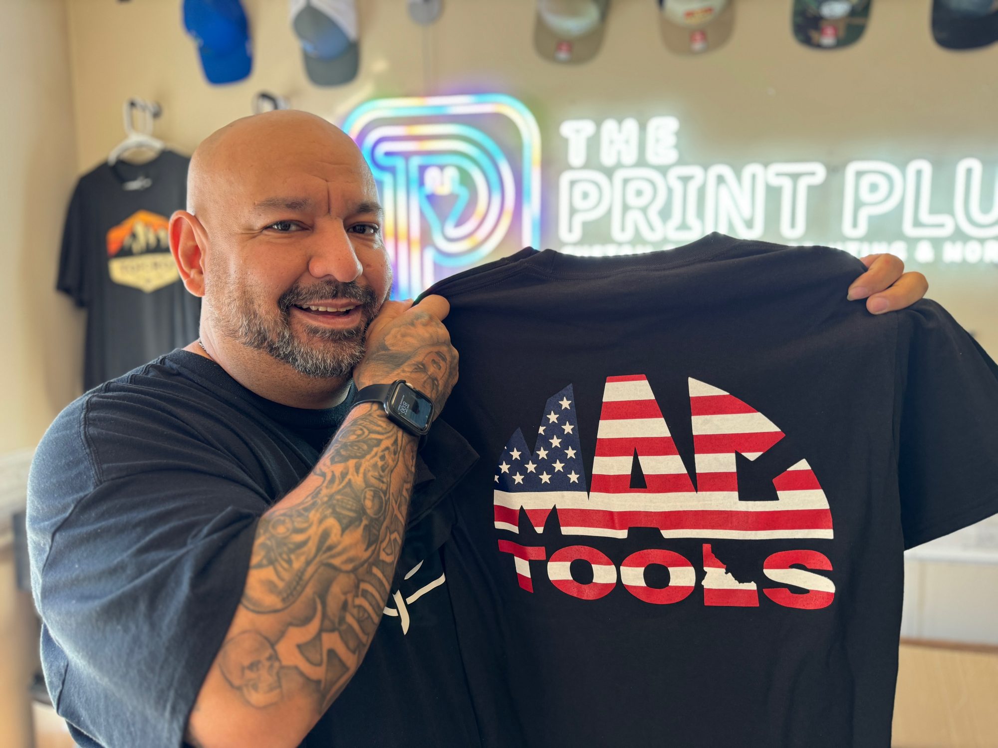 Showing off a custom screen printed t-shirt for a large tool company in Nampa