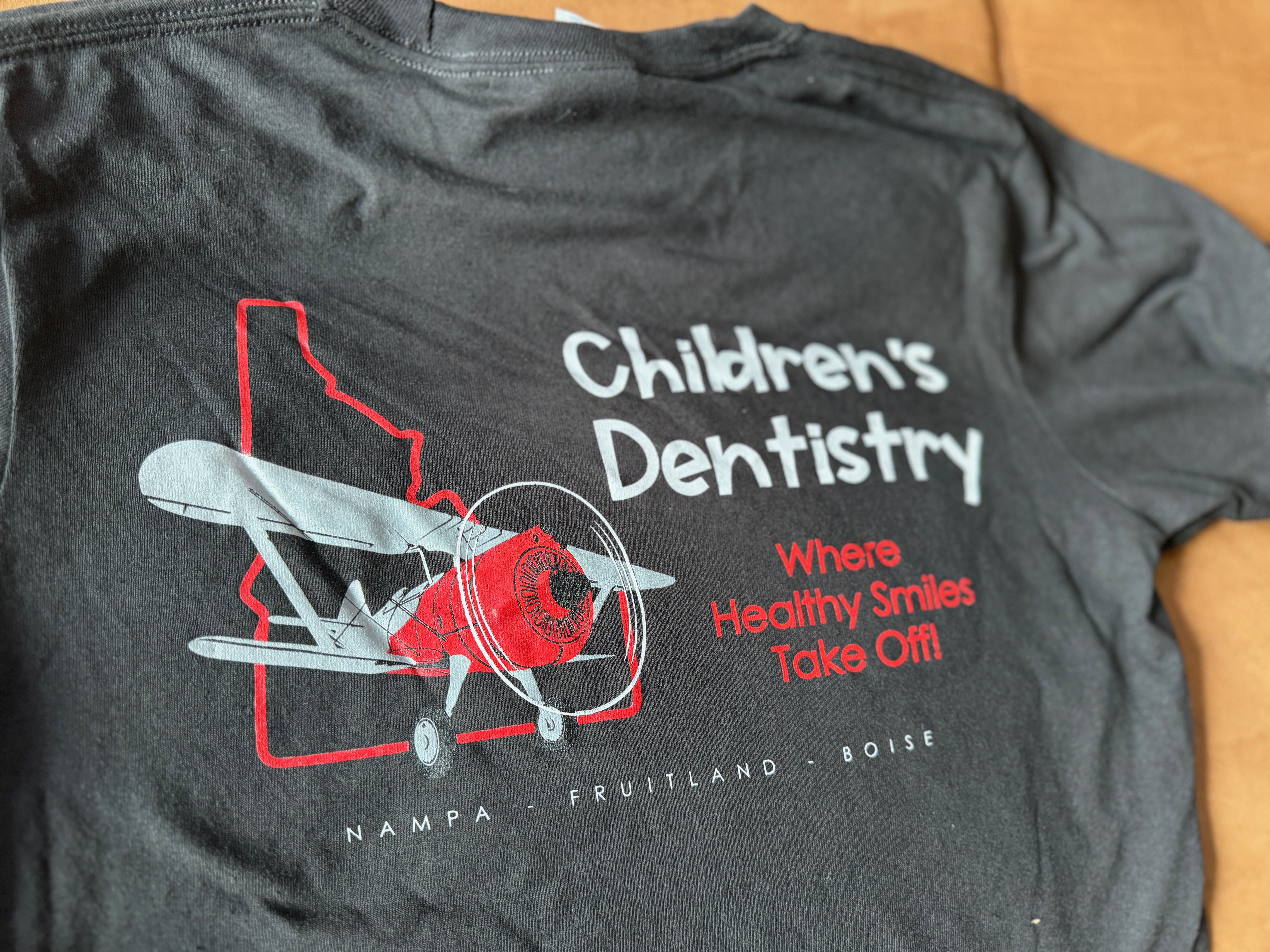 Custom t-shirt for local dentist with screen printed graphic