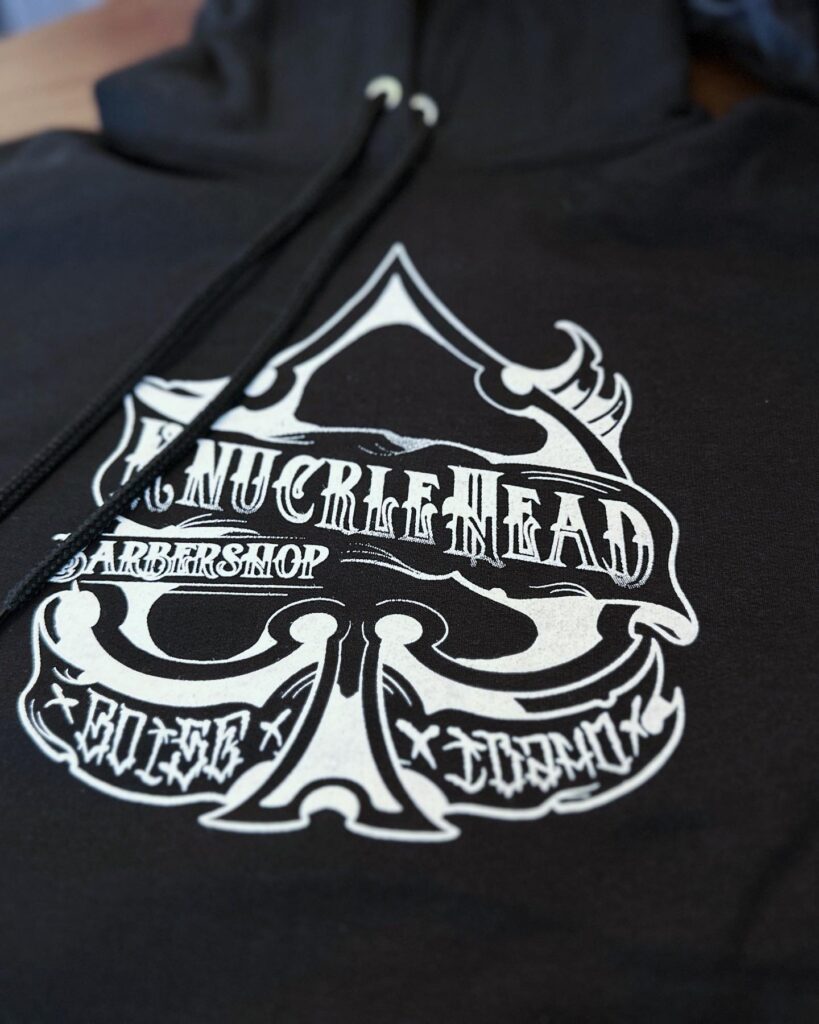 Custom screen printed hoodies for a local tattoo shop in Boise