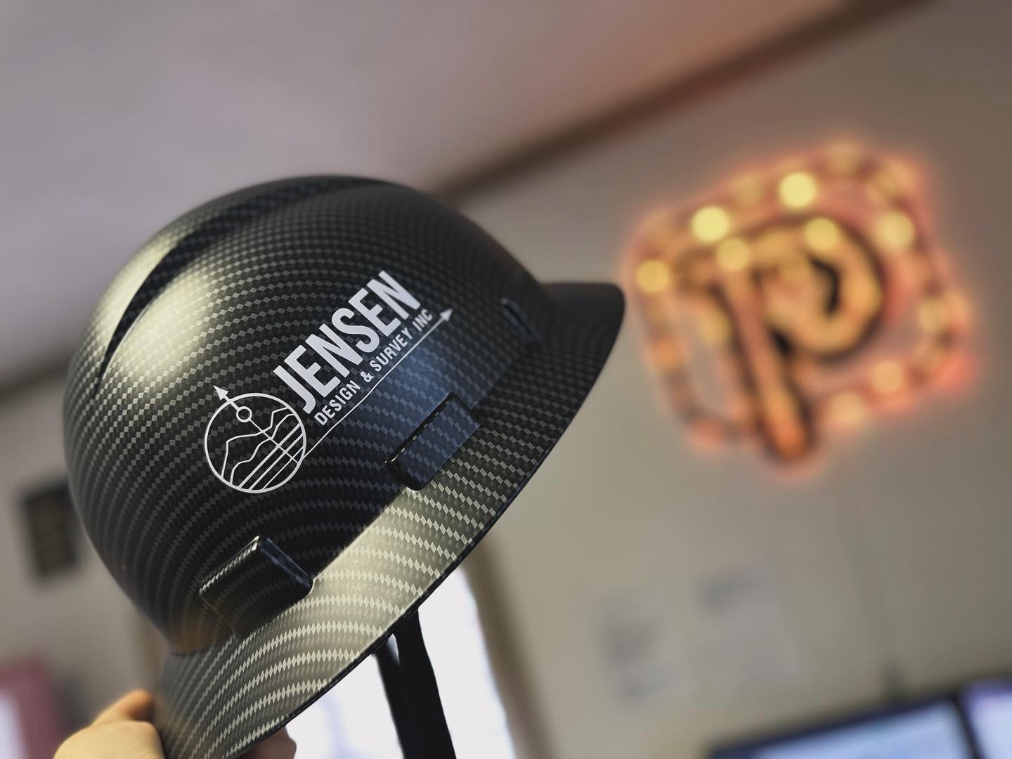 Custom vinyl decals on a construction helmet in Nampa