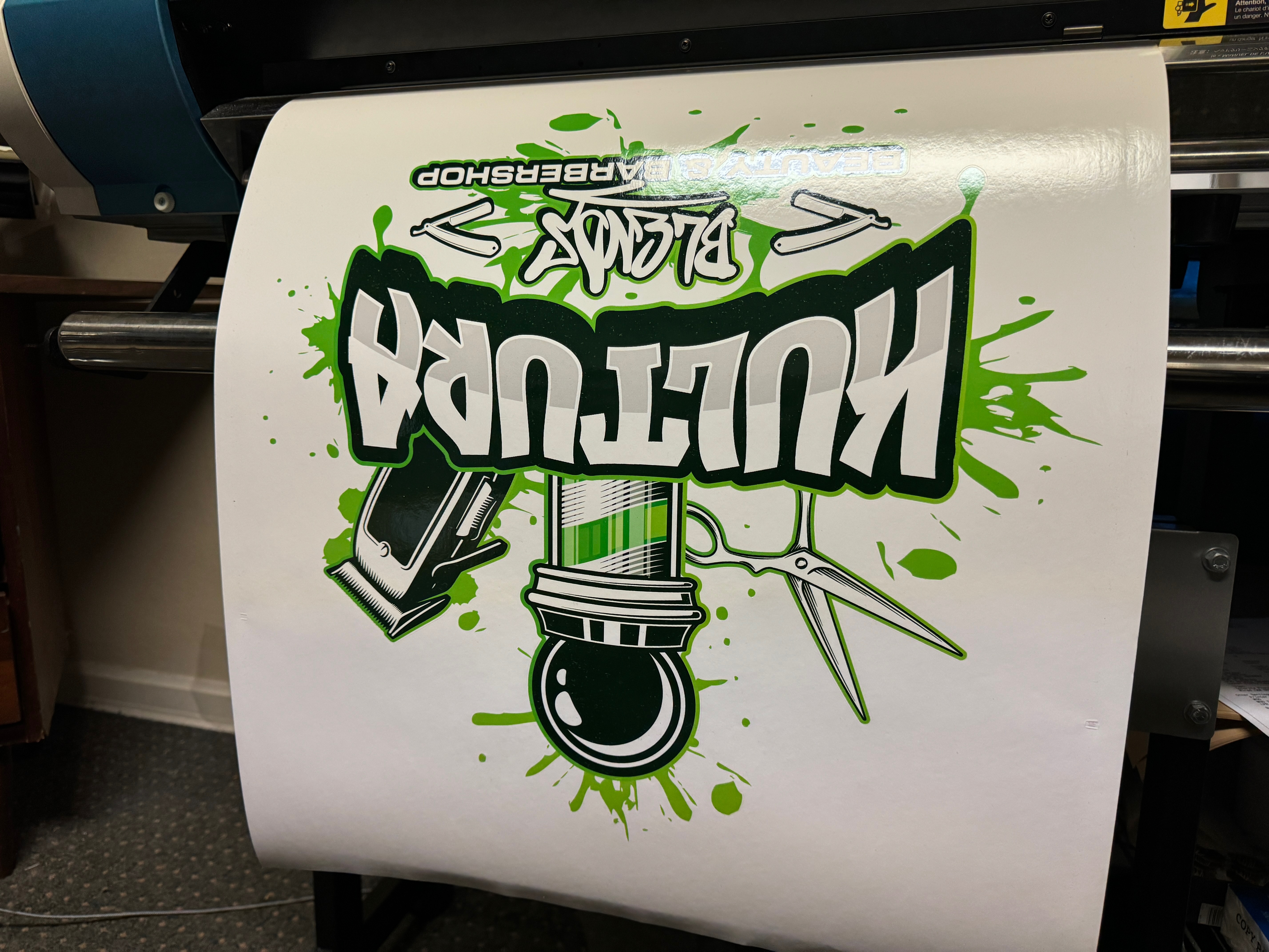 Large format custom sticker / decal being printed at The Print Plug in Nampa