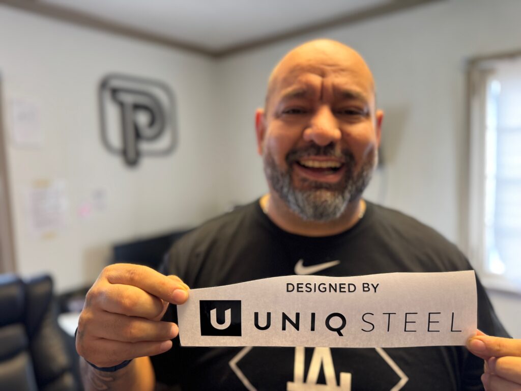 Showing off a custom HTV vinyl transfer at The Print Plug in Nampa