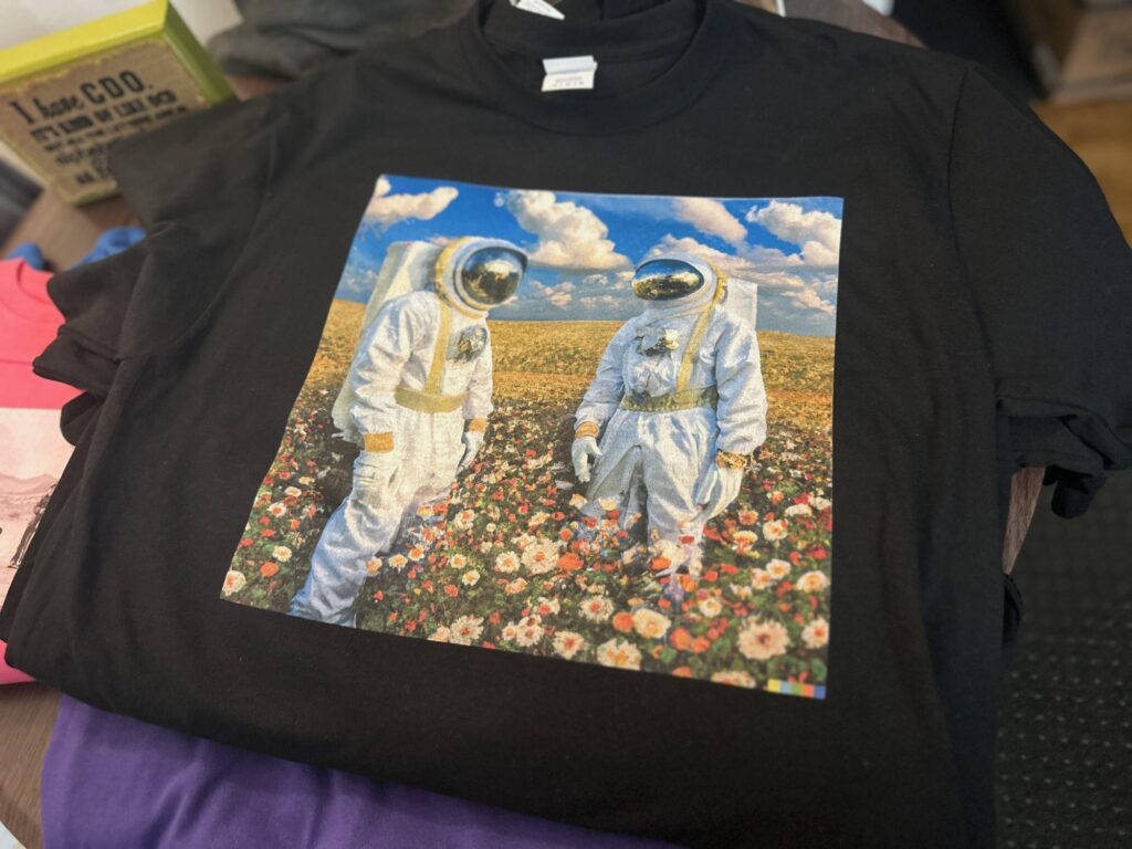 Custom graphic tee made by DTG printing for a local band in Nampa