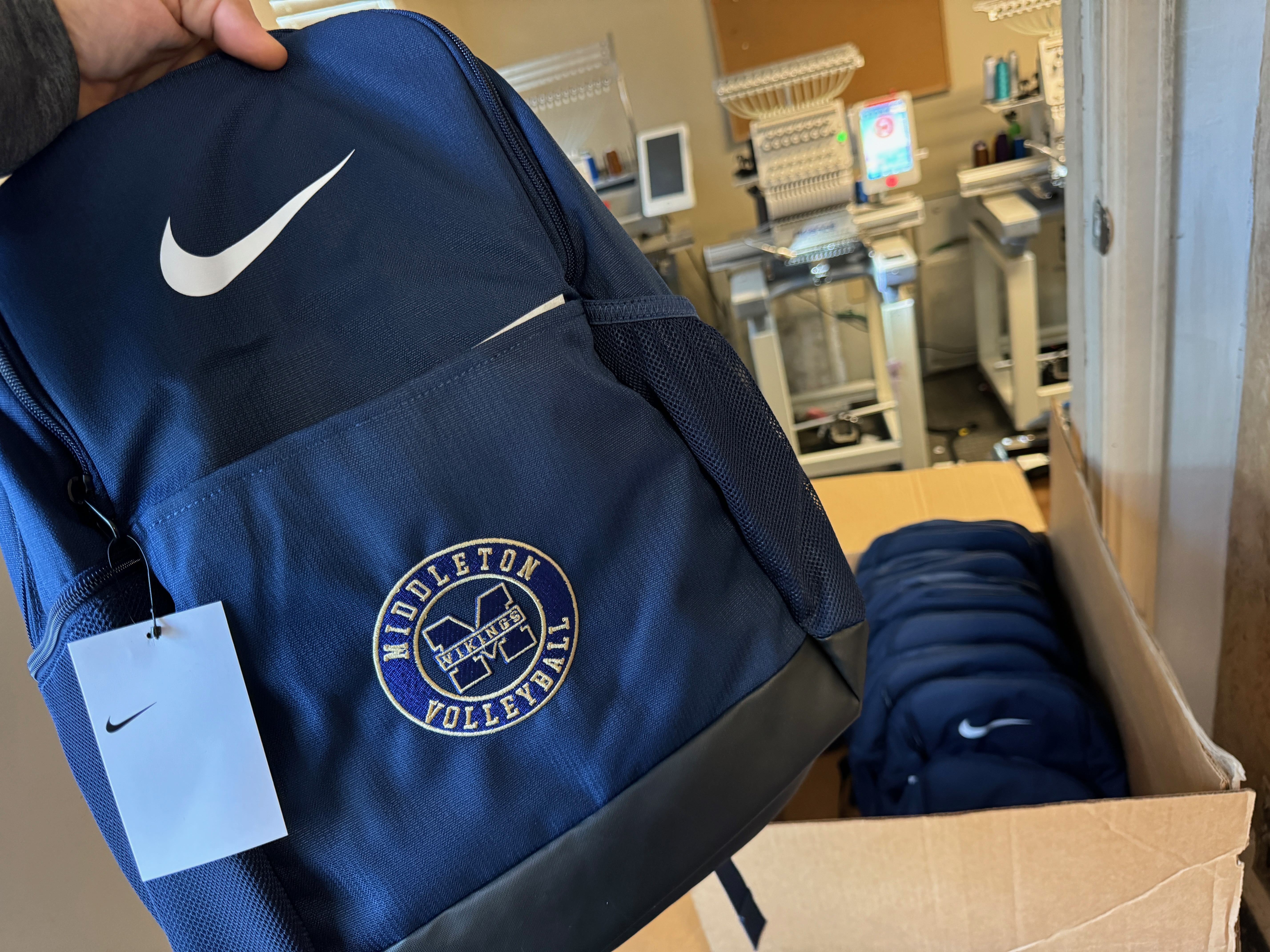 Custom backpack with embroidered logo for a local company near Nampa