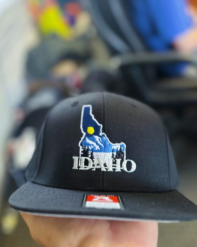 Custom embroidered hat with intricate Idaho logo made for a local brand near Nampa