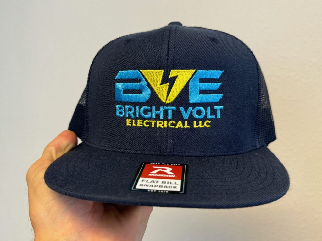 Custom embroidered hat with company logo from The Print Plug embroidery shop in Nampa