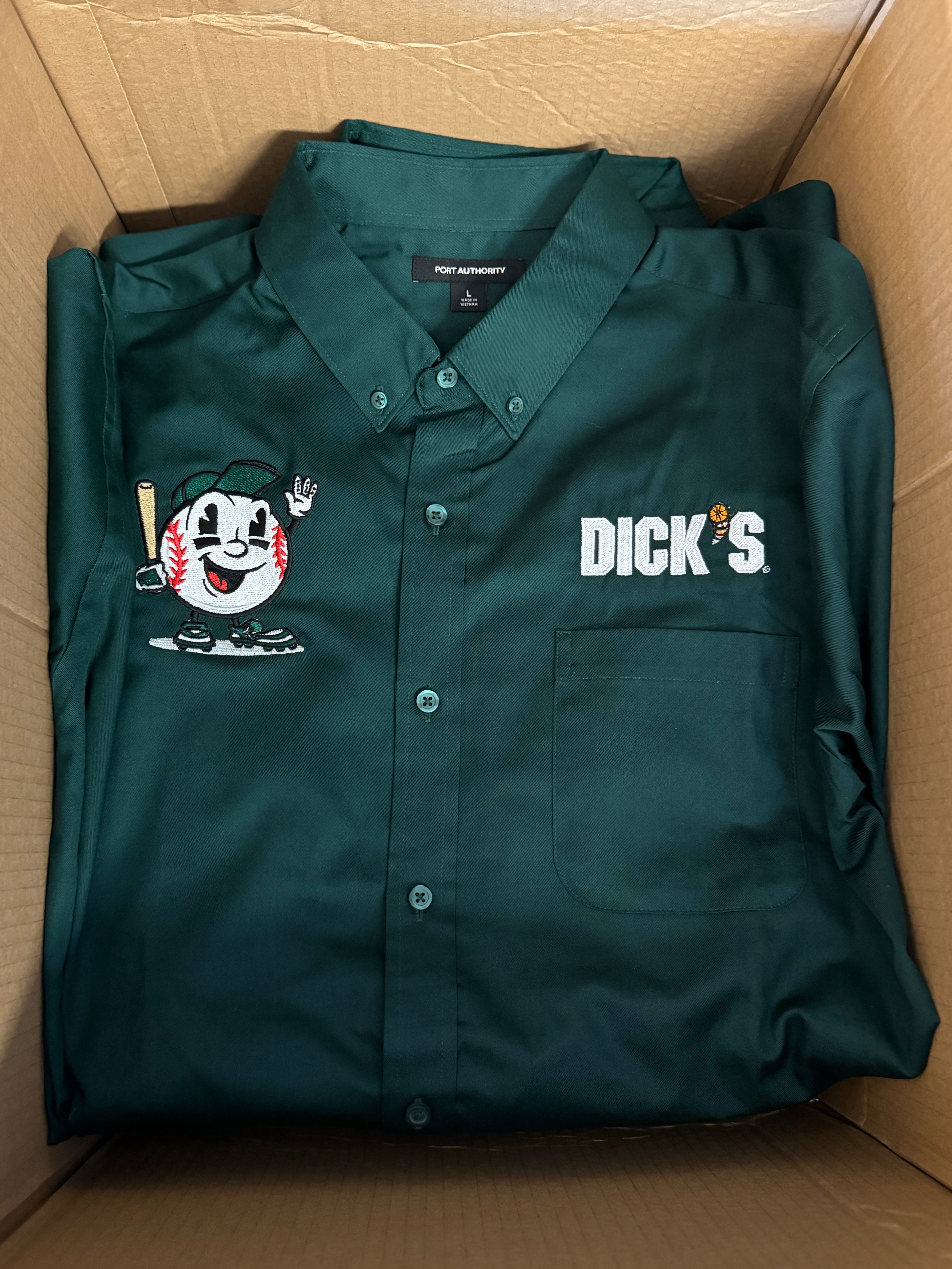 Custom embroidered polo shirts for a large sporting good and apparel company in Nampa