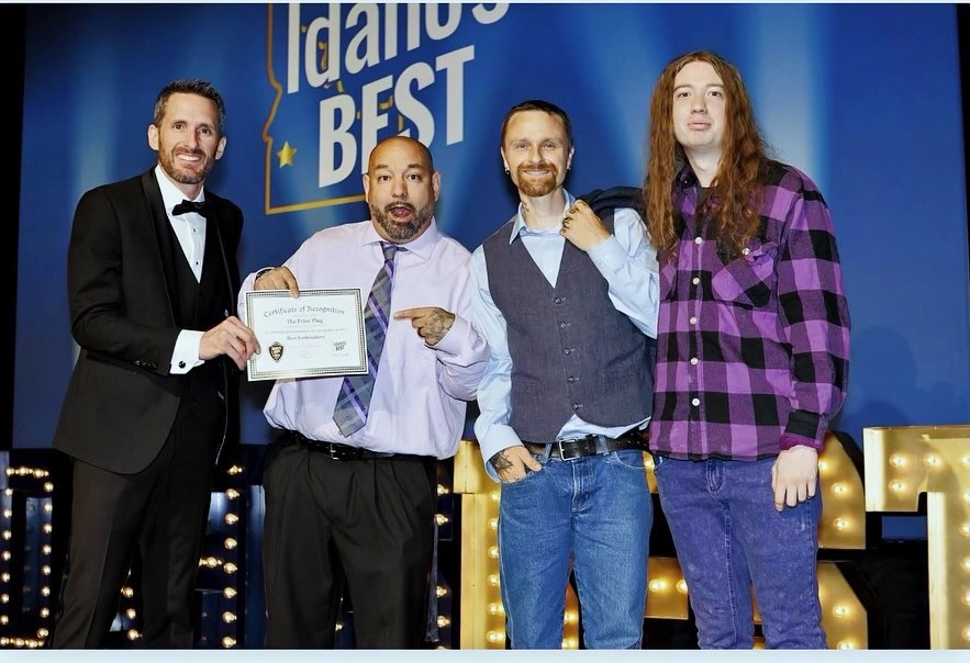 Accepting awards for Idaho's best screen printing and embroidery shop at Idaho's Best awards ceremony