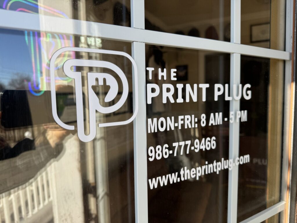 Close up a window decal at The Print Plug in Nampa