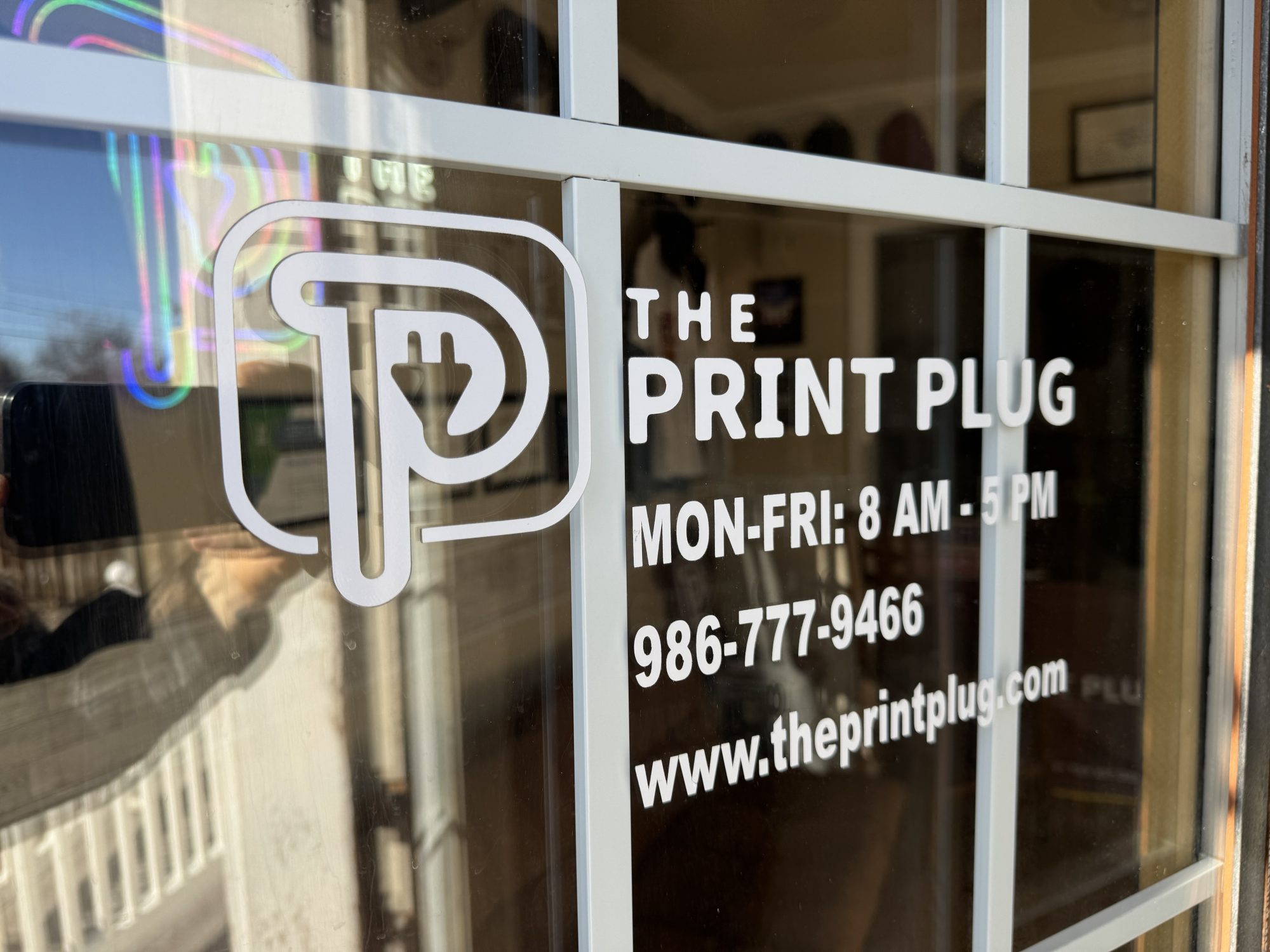 Close up a window decal at The Print Plug in Nampa