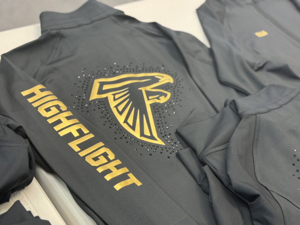 Custom designed shirt with HTV and rhinestones