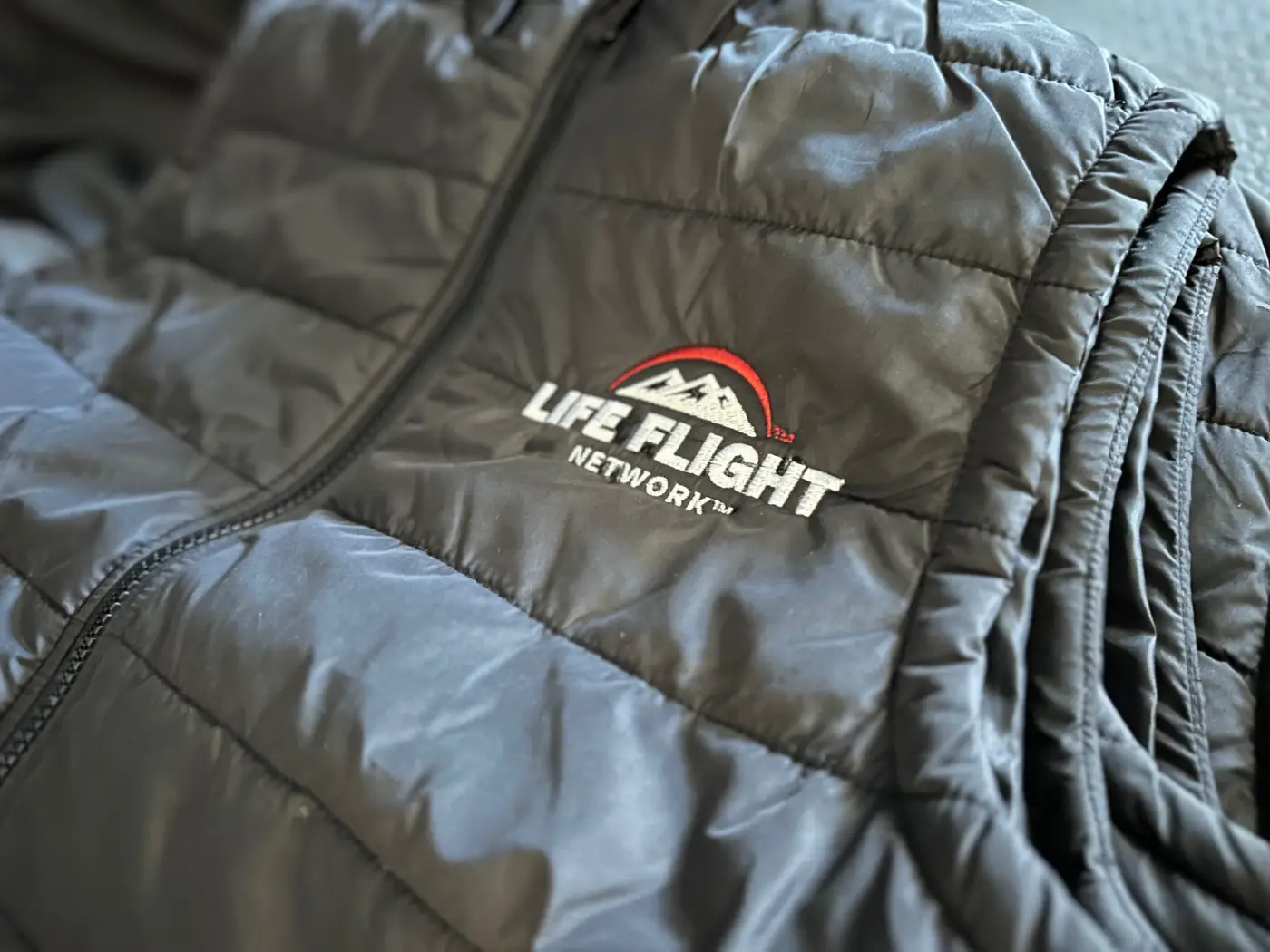 Custom embrodiered puff jacket for local business