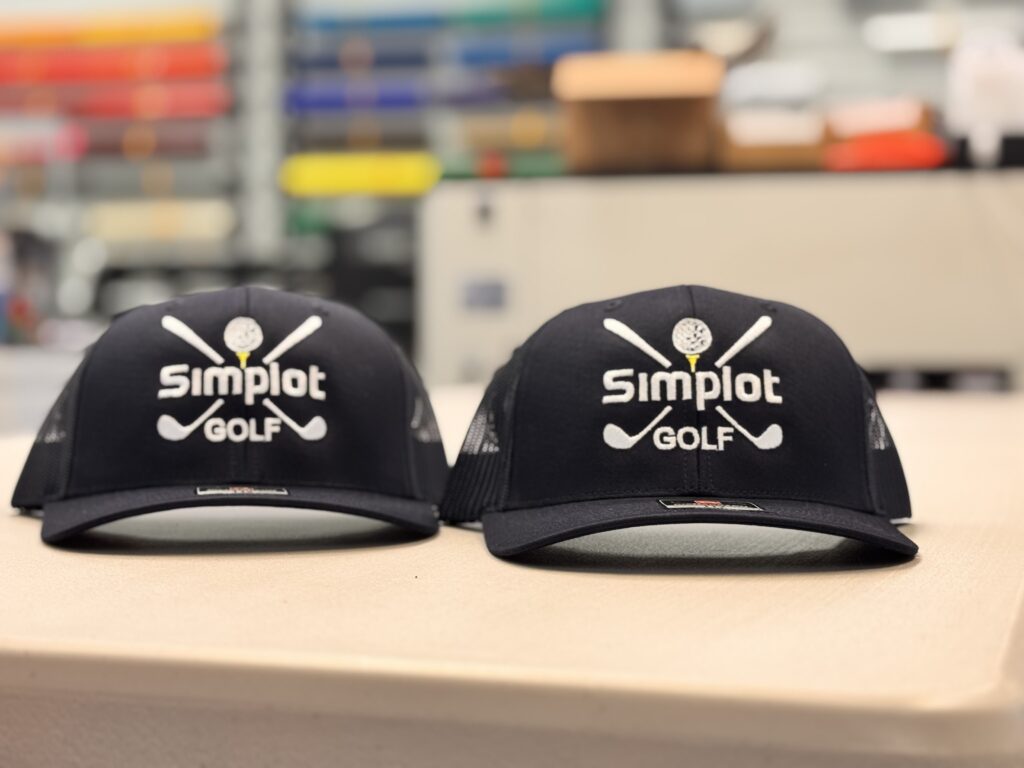 Custom embroidered golf hats for local business
