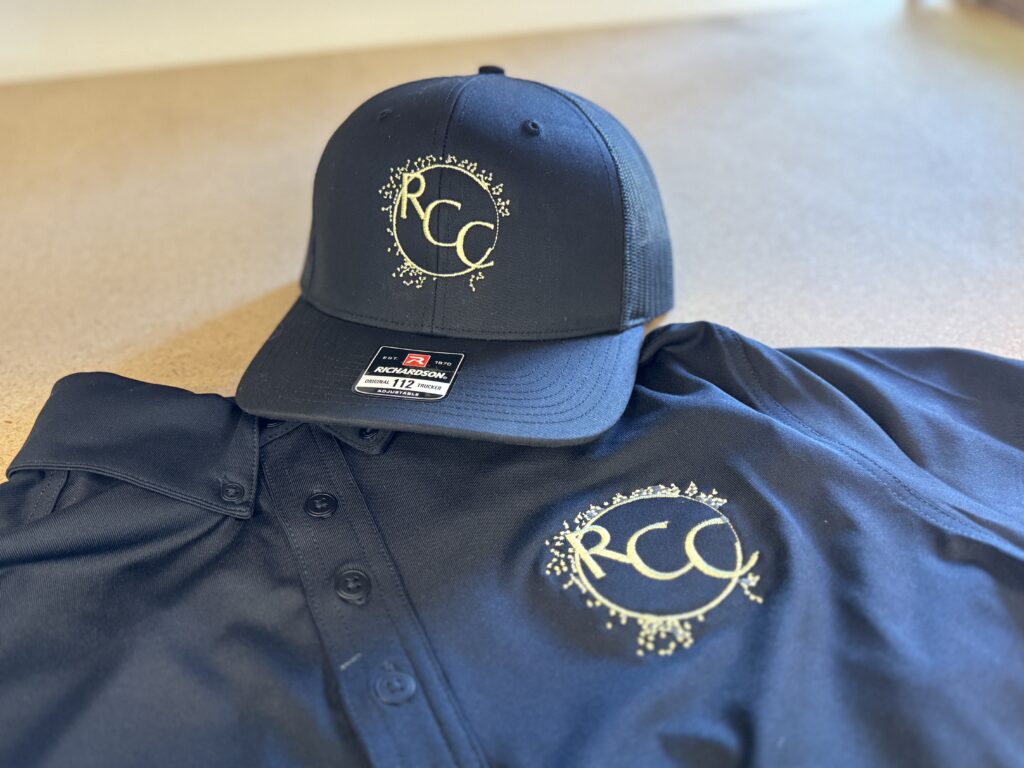 Custom embroidered shirt and hat for local business