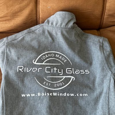 Custom screen printed jacket for a local glass company near Nampa, Idaho