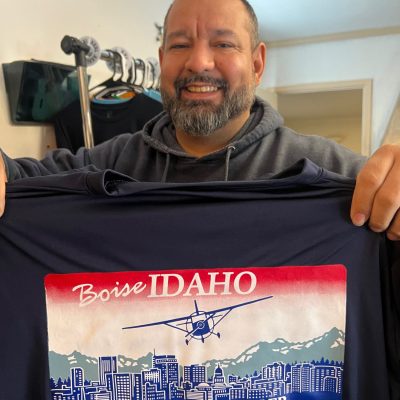 Custom screen printed shirts with license plate design from The Print Plug in Nampa