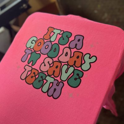 Customized screen printed t-shirt for local dentist office at The Print Plug in Nampa