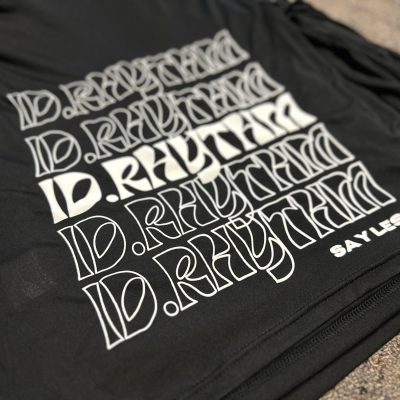 Screen printed design on custom t-shirts at The Print Plug screen printing shop in Nampa