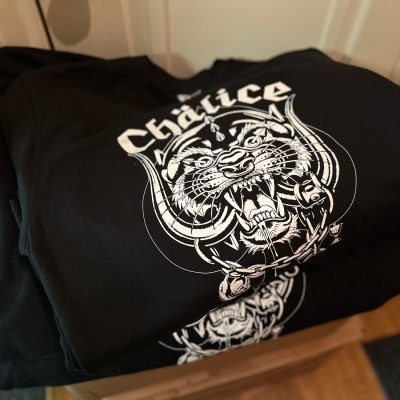 Bulk custom t-shirts with white-on-black screen printing at The Print Plug in Nampa