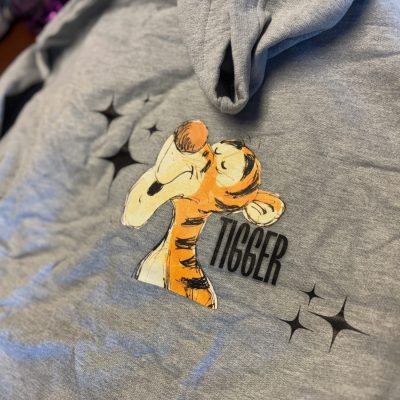 Custom DTG printing of a pop culture cartoon on a graphic tee