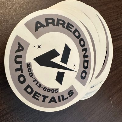 Round cut custom stickers for local automotive business in Nampa