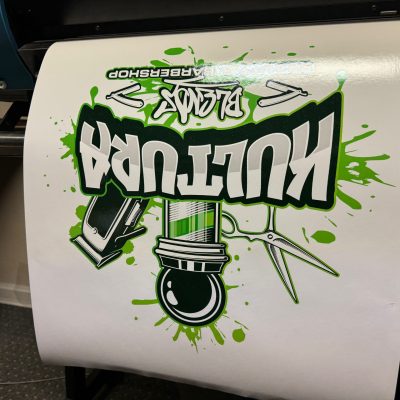 Large format custom sticker / decal being printed at The Print Plug in Nampa