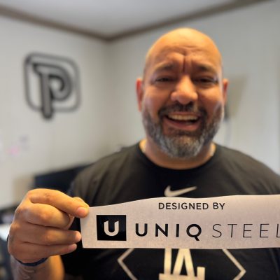 Showing off a custom HTV vinyl transfer at The Print Plug in Nampa