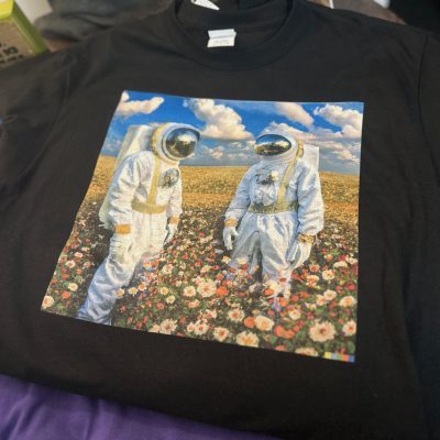 Custom graphic tee made by DTG printing for a local band in Nampa