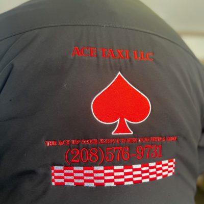 Full back custom embroidered jacket with logo from The Print Plug in Nampa