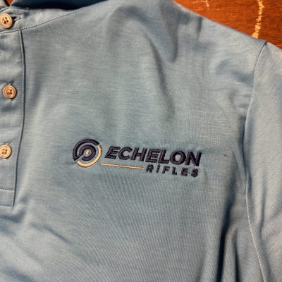 Custom polo embroidery for a local gun store near Nampa