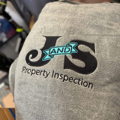 Custom embroidered logo on back placement of a fleece sweatshirt