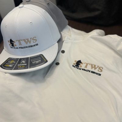 Custom embroidered hat with a custom embroidered polo shirt rom The Print Plug for a local company near Nampa