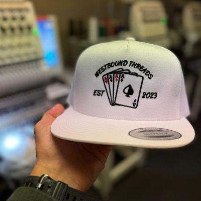 Custom embroidered hat with business logo at The Print Plug embroidery shop in Nampa