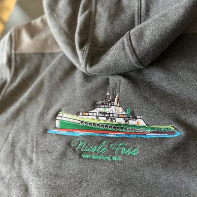Custom embroidered logo on a hoodie for a local company in Nampa