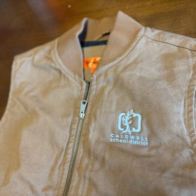 Custom embroidered vest for local school from The Print Plug embroidery shop in Nampa