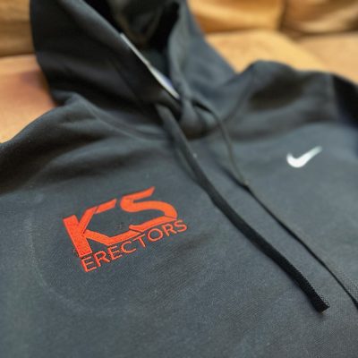 Custom embroidered hoodie with logo on right chest for a construction company near Nampa