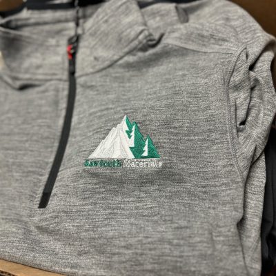 Custom zip-up vest for a local company from The Print Plug embroidery shop in Nampa