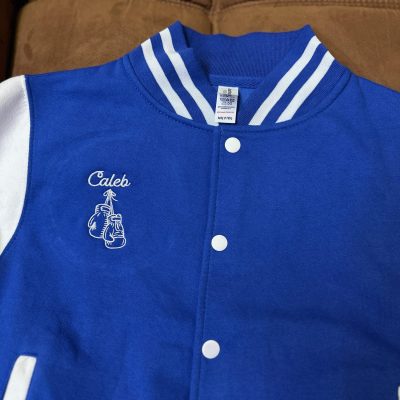 Custom embroidered jacket for a sports team from The Print Plug in Nampa