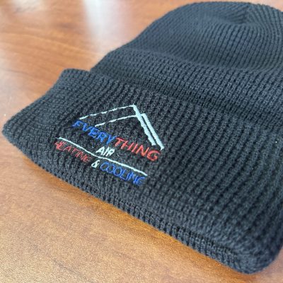 Customized beanies embroidered for local business