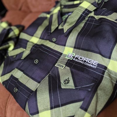 Custom embroidered flannel shirts with logo embroidered over the pocket for a local company near Boise