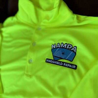 Safety green custom embroidered polo with left chest logo embroidery from The Print Plug in Nampa