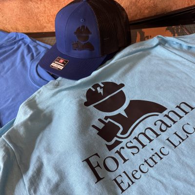 Custom HTV print on shirts with custom embroidered hats for a local electrician in Nampa