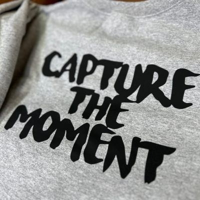 Close up of a custom HTV print on a t-shirt at The Print Plug in Nampa