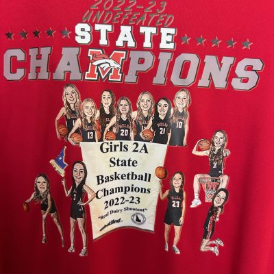 Custom heat-transfer vinyl print on a graphic tee for a local sports team in Nampa