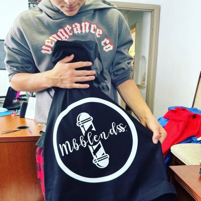 Custom HTV print applied onto a vinyl shirt at The Print Plug in Nampa