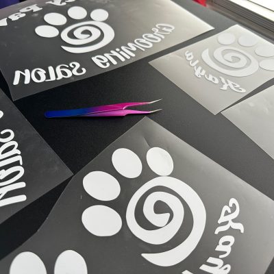 Custom HTV prints ready to be applied to custom vinyl shirts at The Print Plug in Nampa