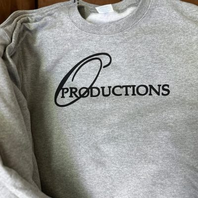 Custom HTV print on the front of a long sleeve t-shirt for a local business near Nampa